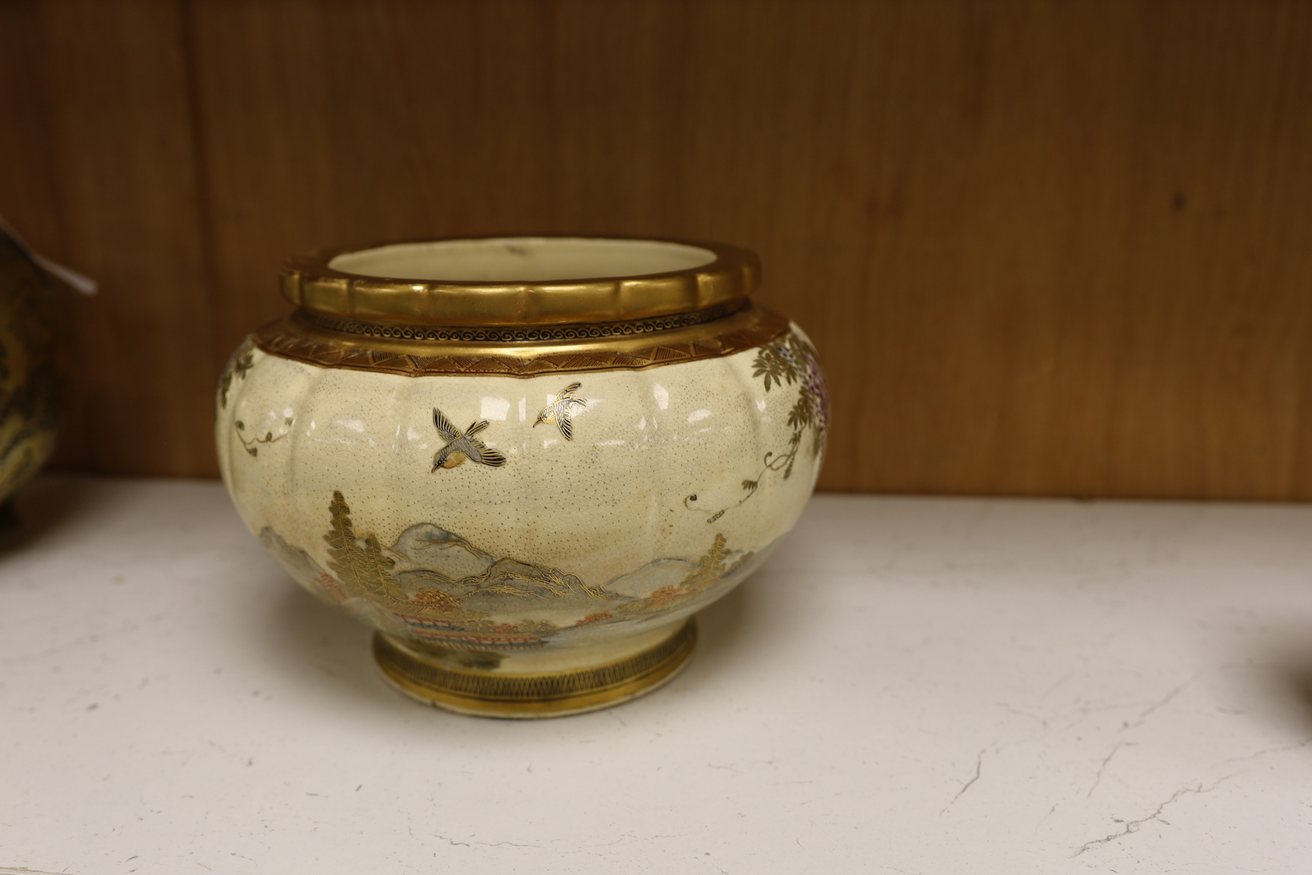 A Japanese Satsuma large bowl, 15cm high. Condition - heavily stain inside some grazing to lower rim and gilt scuffed on top rim of bowl